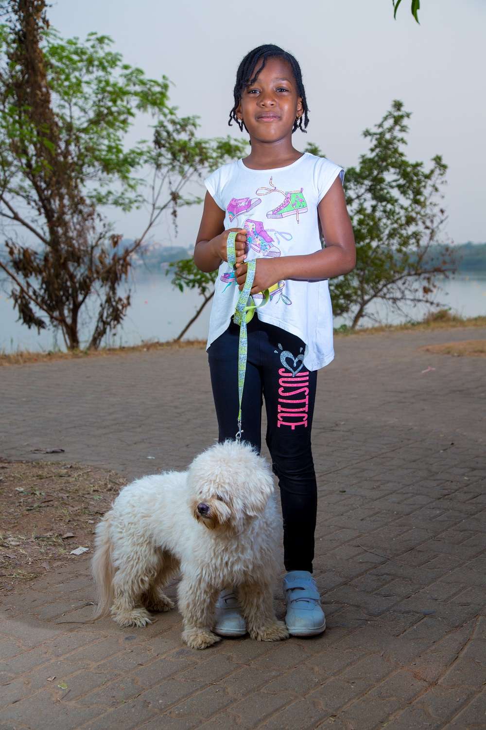 girl-standing-with-dog-image-from-tristetix.jpg